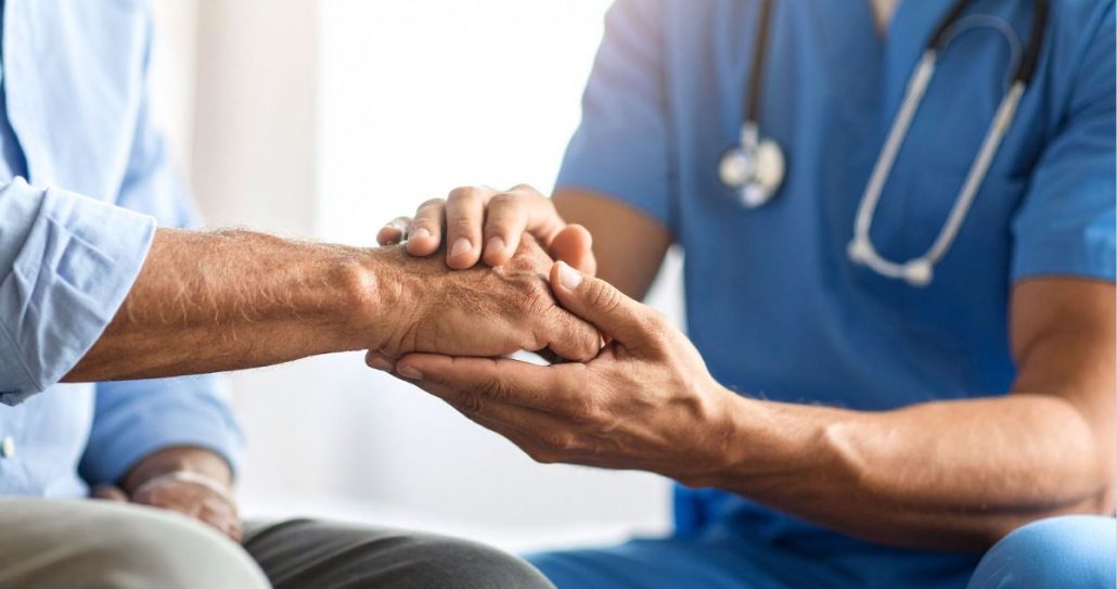 doctor supporting patient